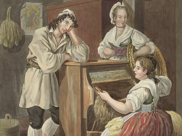 Ein Mann und zwei Frauen in Trachten des Kantons Schwyz bei der Seidenherstellung
